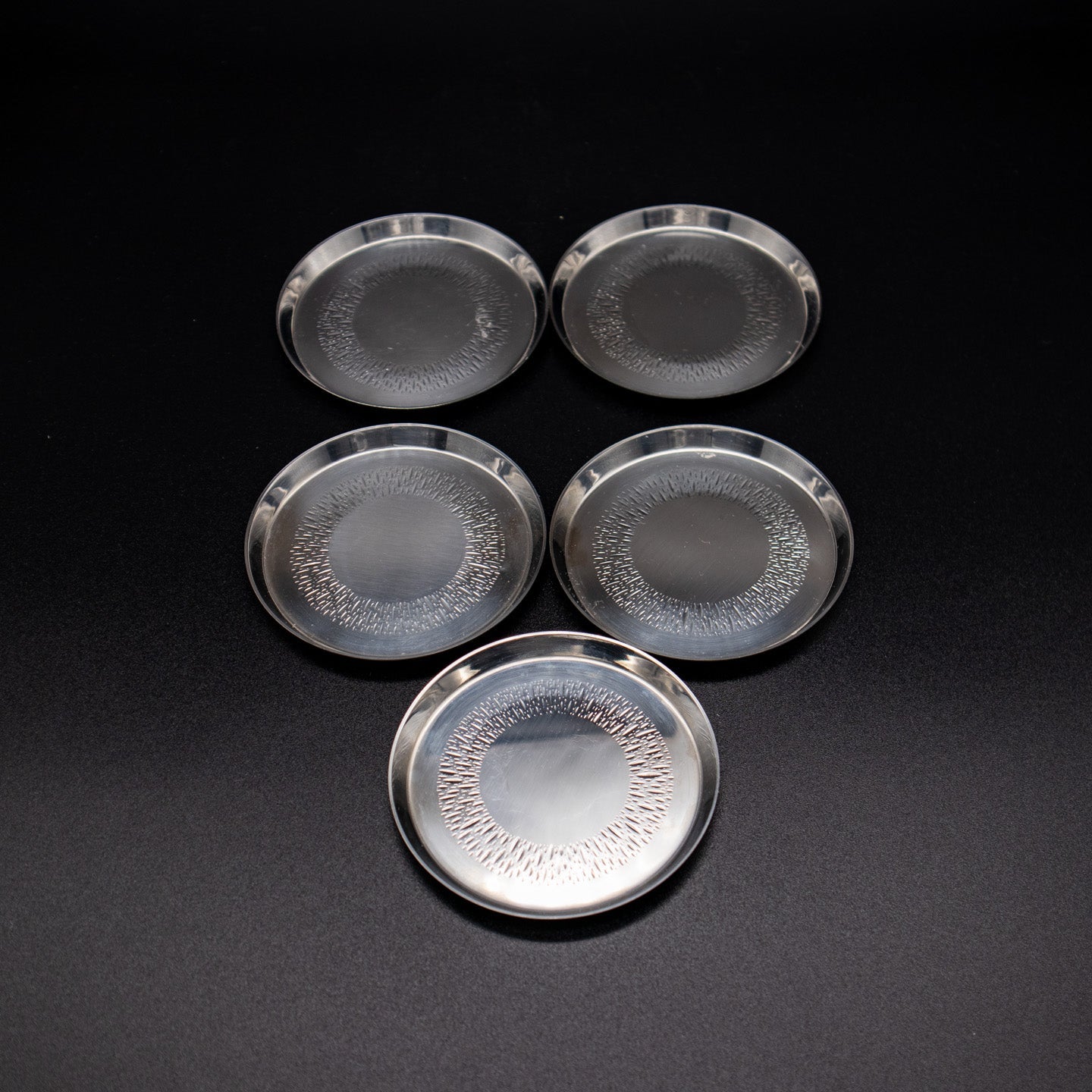 Untersetzer Berndorf, hinter einander