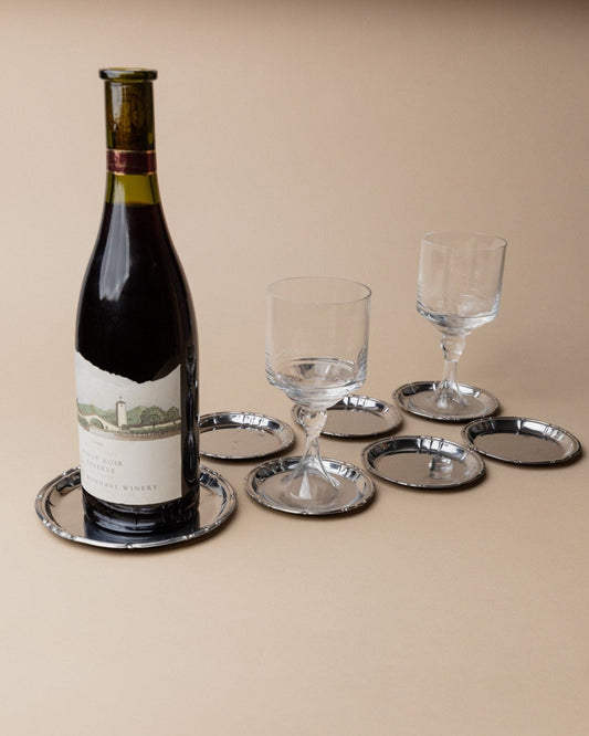 Vintage coasters stainless steel Italy 1980s by Studio Vilhelm set of 7