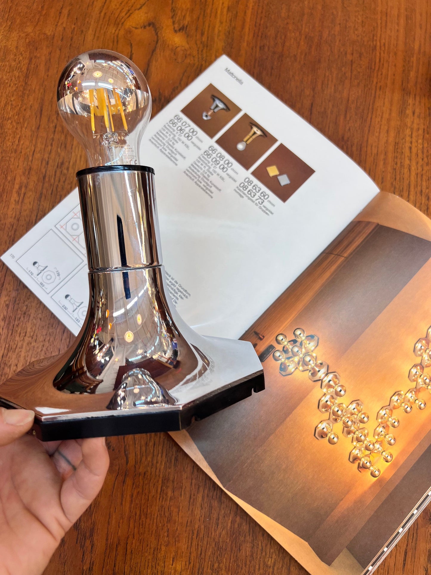 Vintage head mirror wall lamp by STAFF