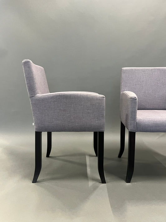 Dining chair in grey armrests with curved legs