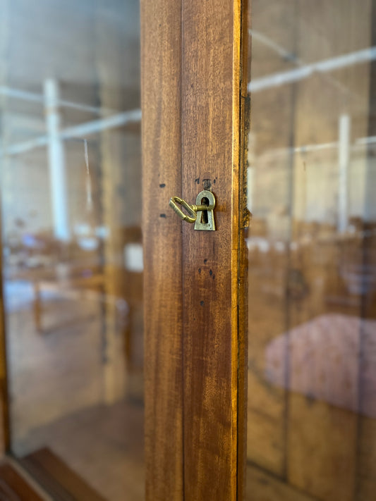 Antique display cabinet made of solid wood, two-part with glass doors