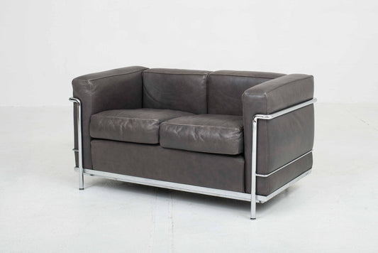 Vintage 2-seater sofa LC2 by Le Corbusier for Cassina in grey natural leather