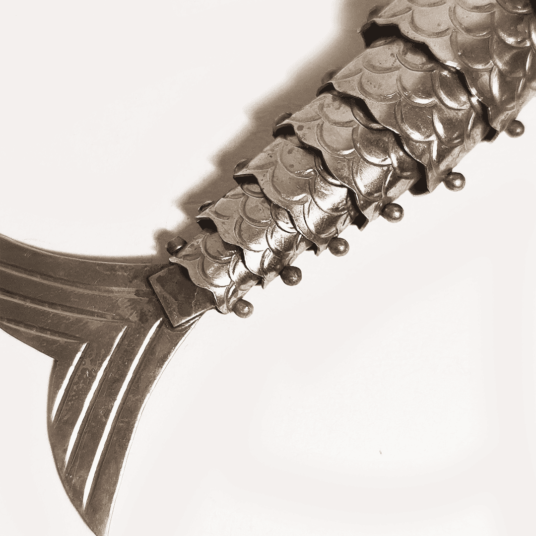 Décapsuleur vintage en forme de poisson argenté