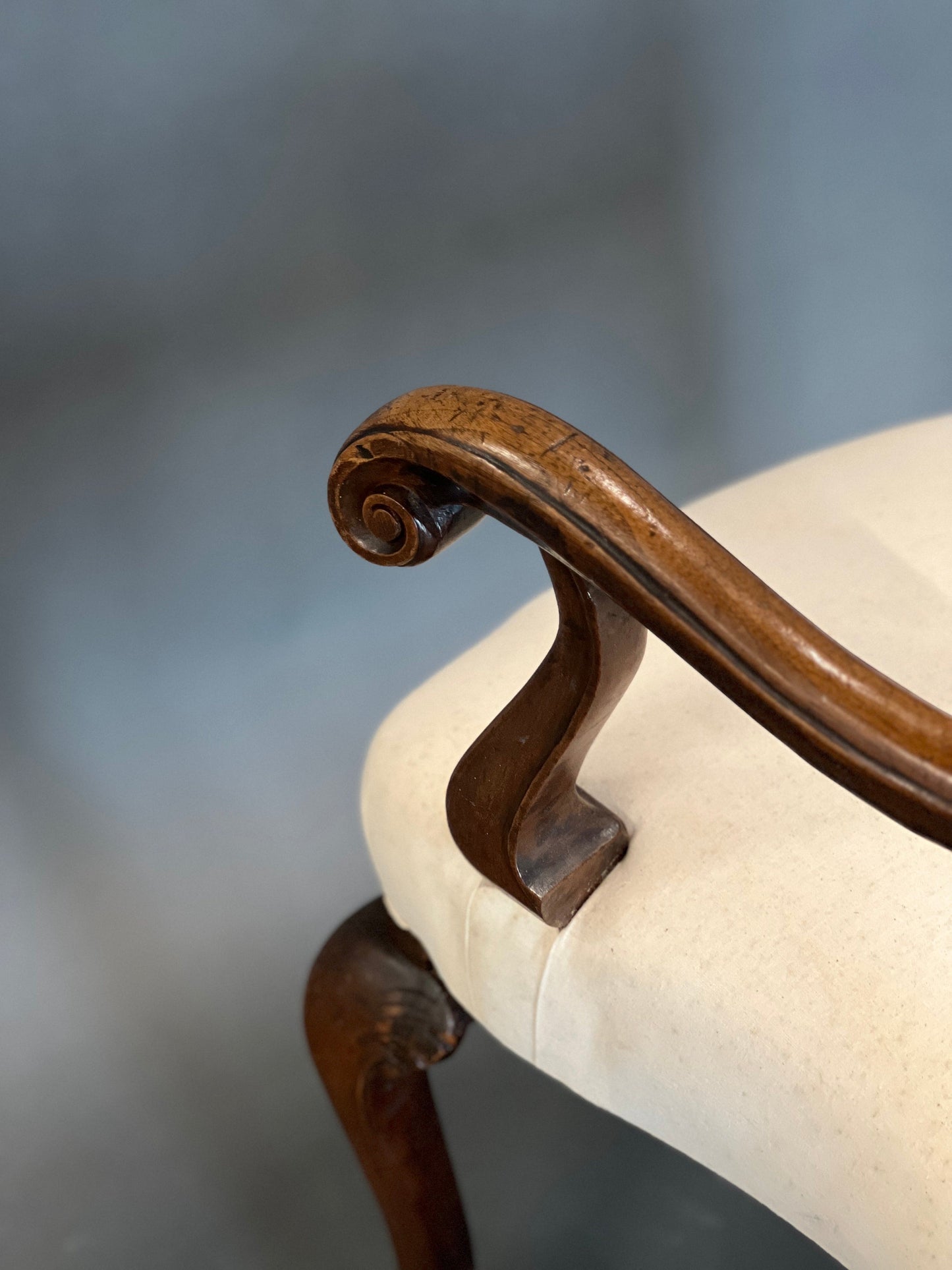 Antique armchair with armrests