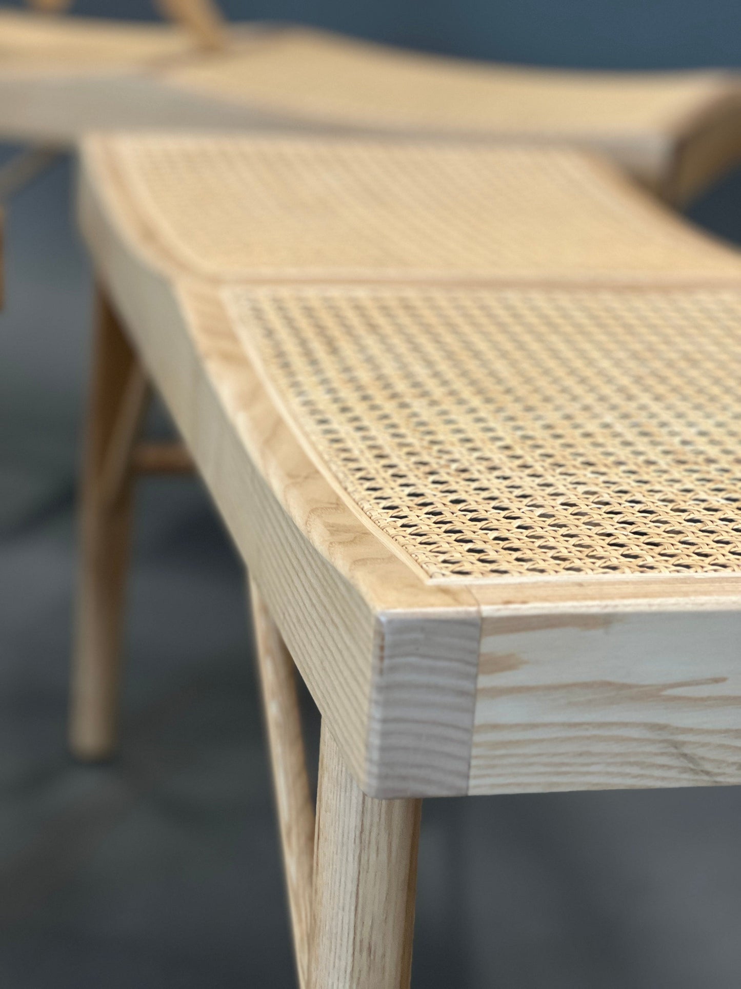 Bench made of wood and rattan