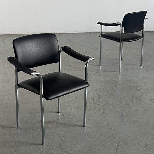 Vintage dining chair black imitation leather plastic chrome-plated steel 1980s Italy