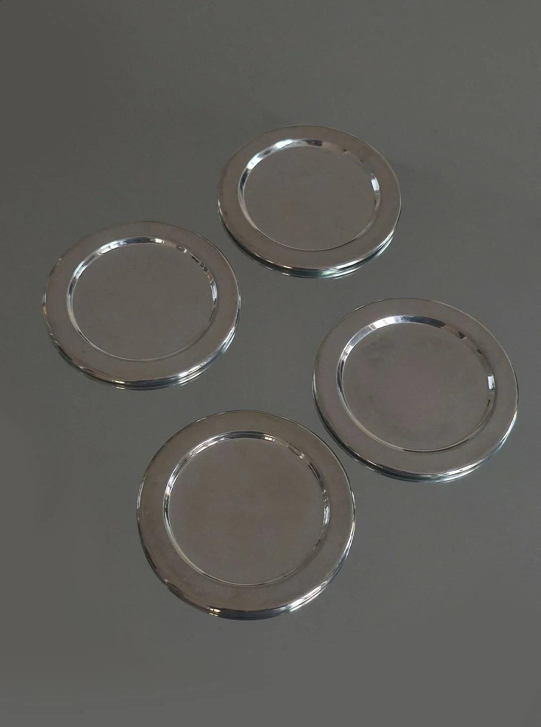 Set von 6 Untersetzer aus Metall in Silber