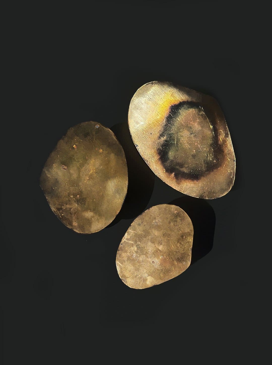 Trio of brass boxes in gold