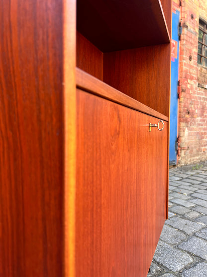 Teak shelf with lockable compartment