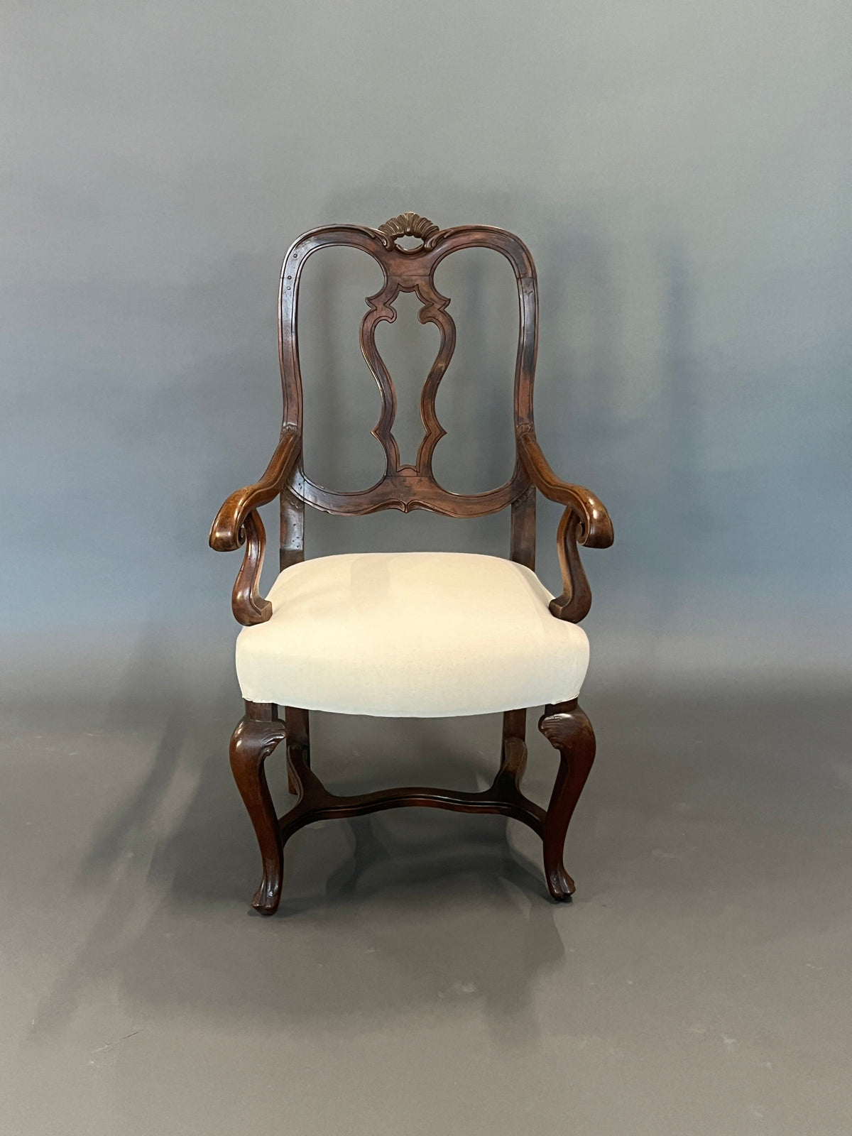 Antique armchair with armrests