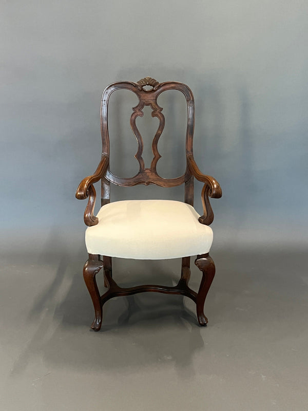 Antique armchair with armrests
