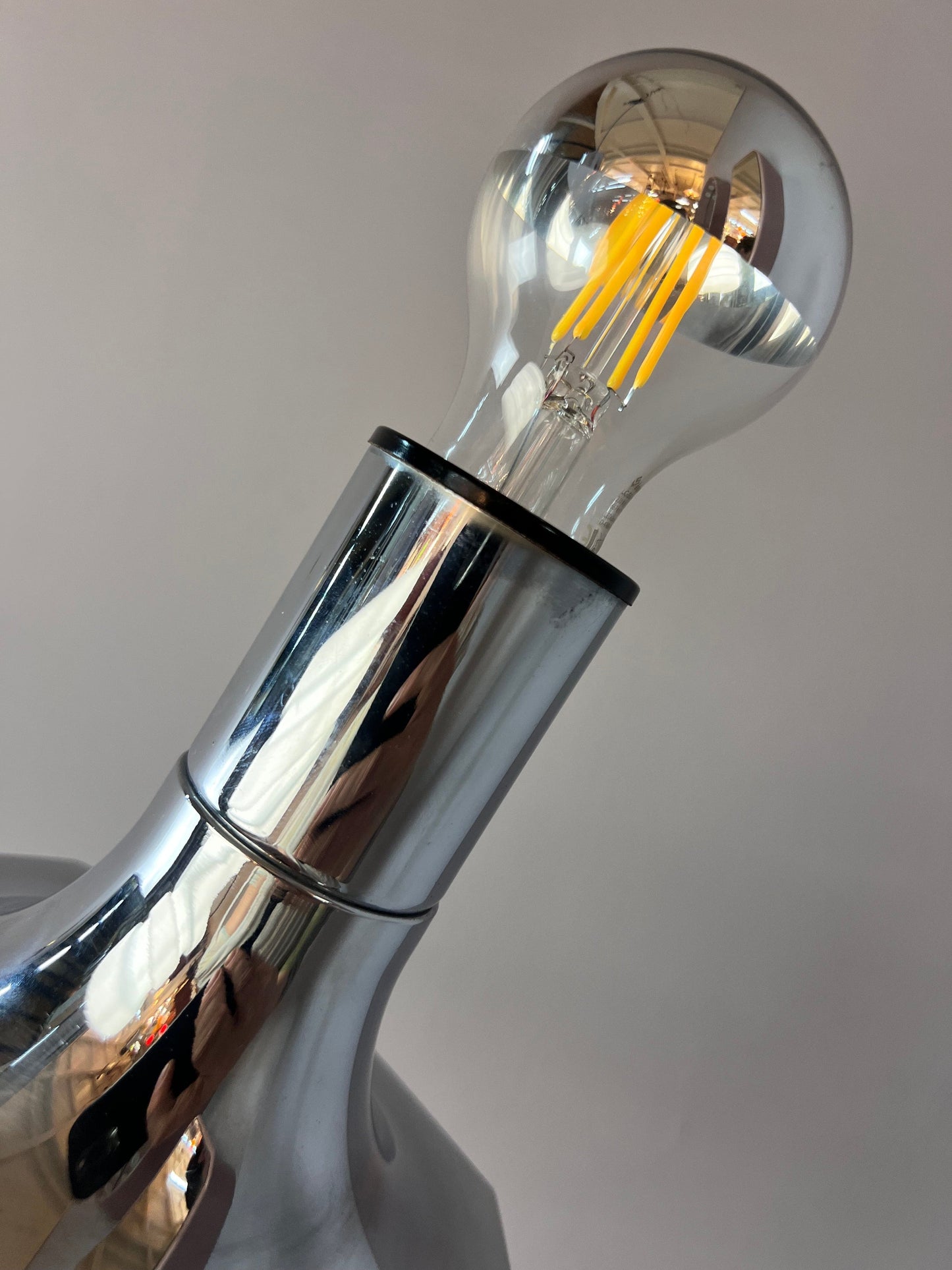 Vintage head mirror wall lamp by STAFF