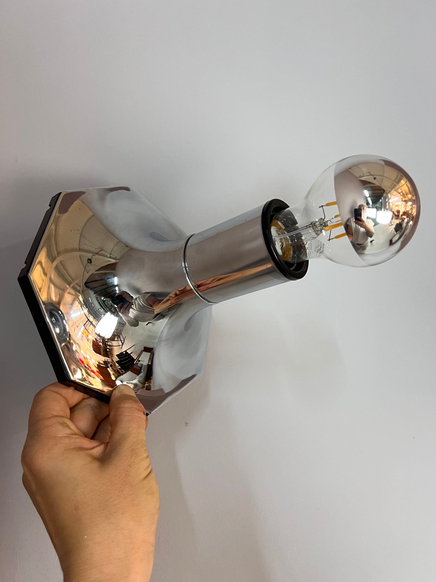 Vintage head mirror wall lamp by STAFF