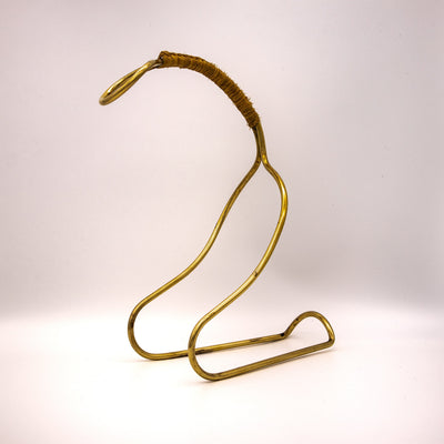 Bottle holder brass and raffia in the style of Carl Auböck