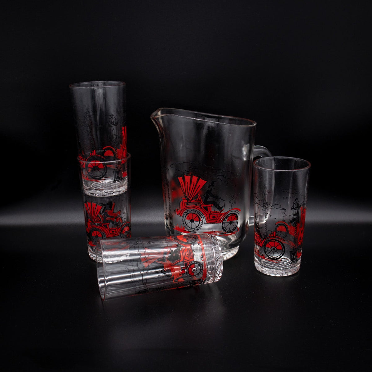 Vintage drinking glass set with automotives