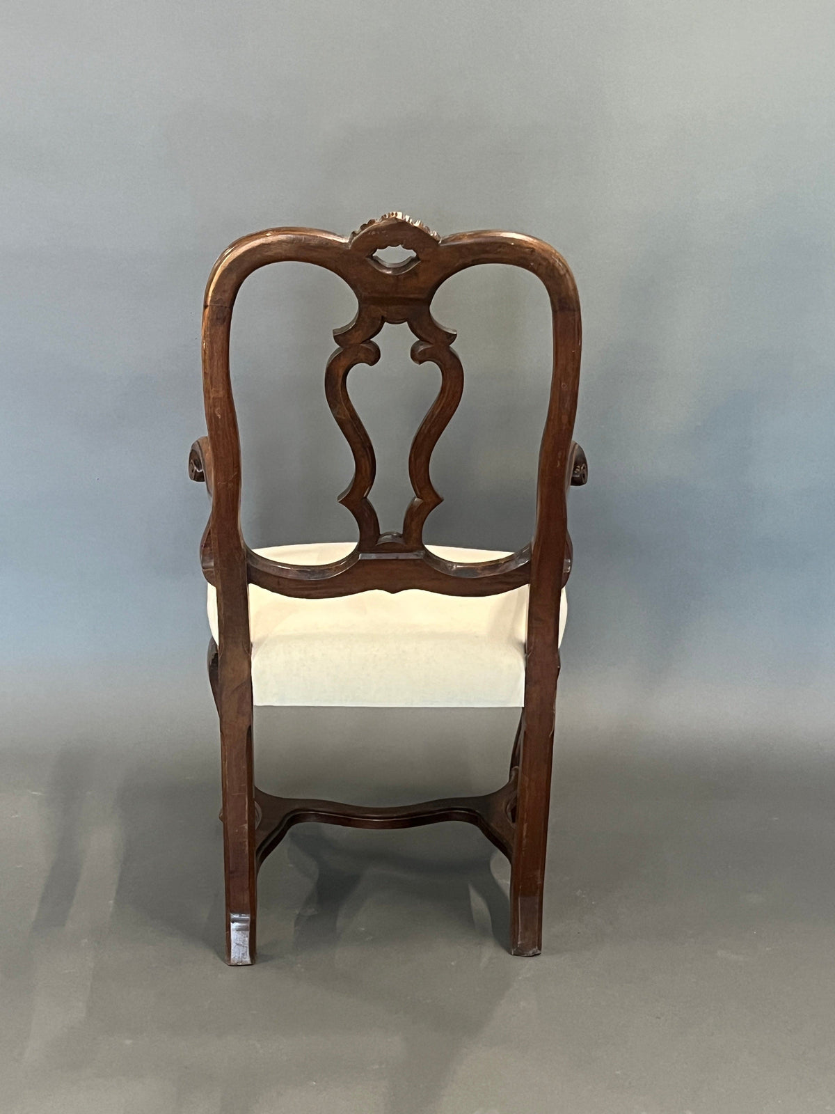 Antique armchair with armrests