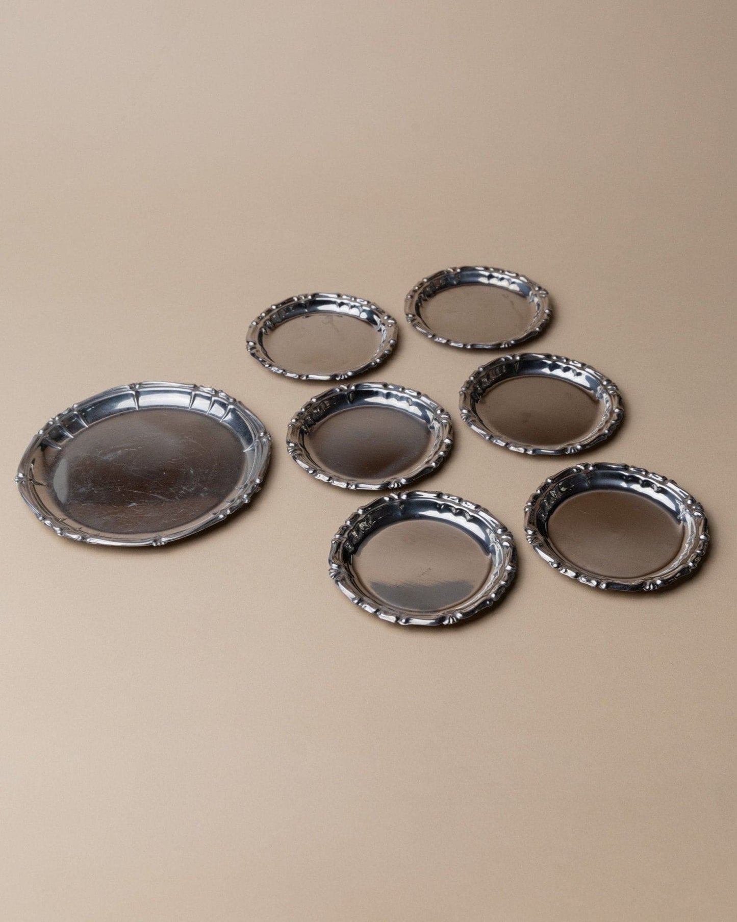 Vintage Untersetzer Edelstahl Italien 1980er zeitloses Design Set von 7