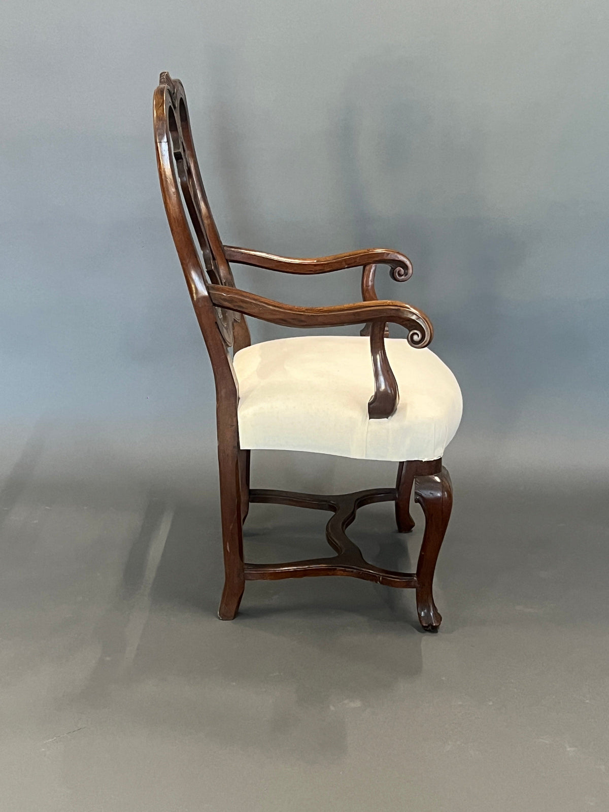 Antique armchair with armrests