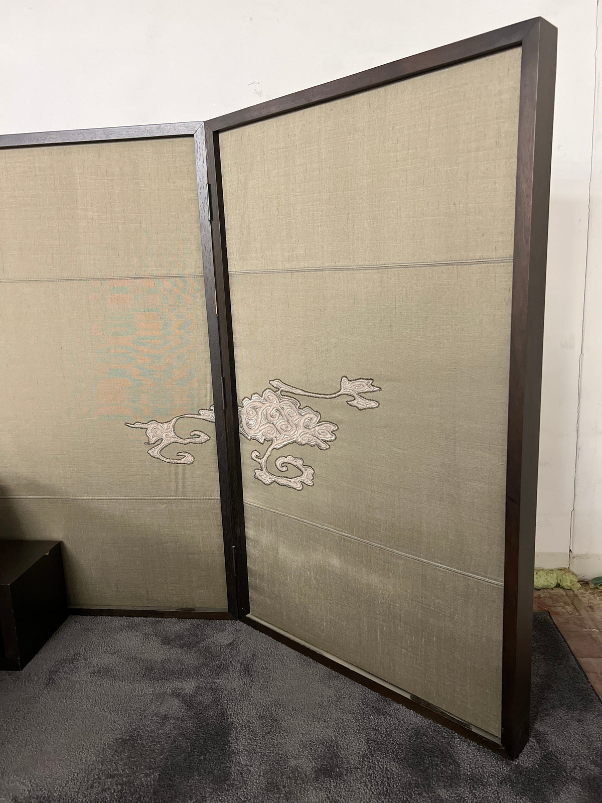 Double bed with screen headboard by Christian Liaigre