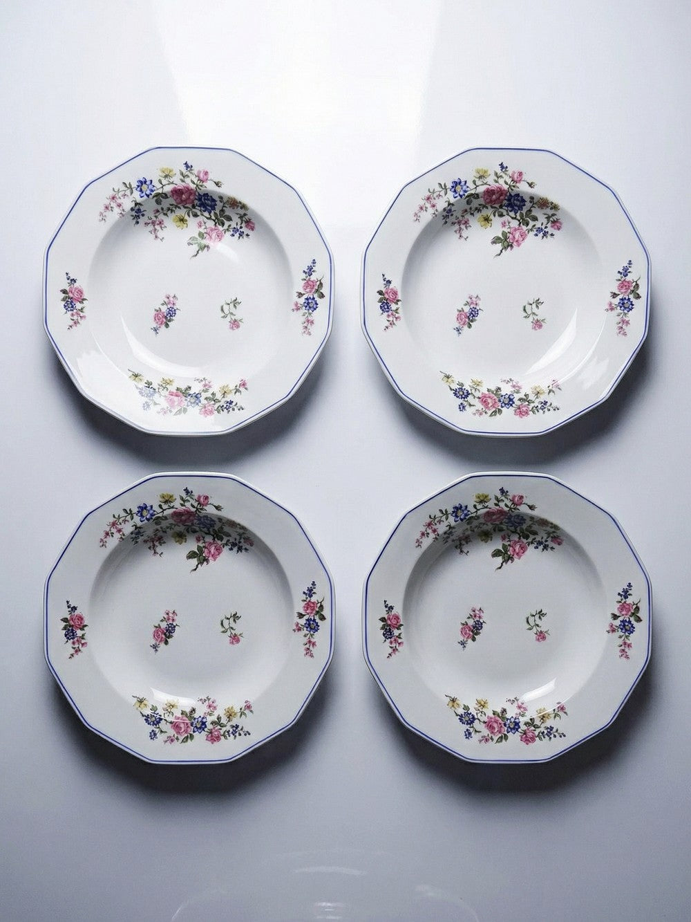 Set von 4 Vintage Teller von Bernardaud für B und C° florales Dekor