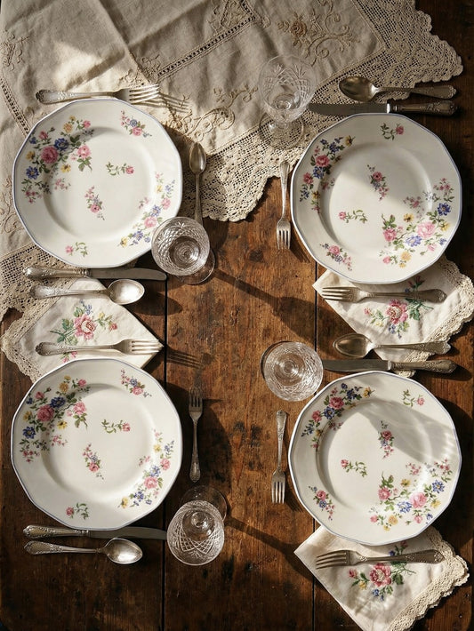 Vintage Teller Set von 4 von Bernardaud für Bernardaud Limoges floral