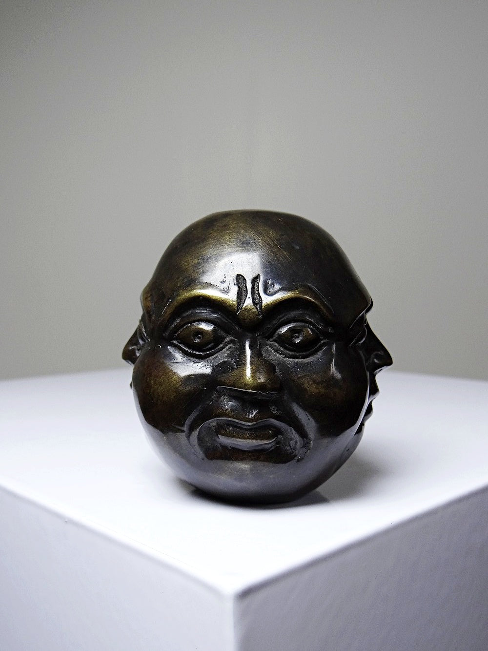Vintage Buddha Kopf viergesichtig aus patiniertem Messing dunkelbraun gold Asien