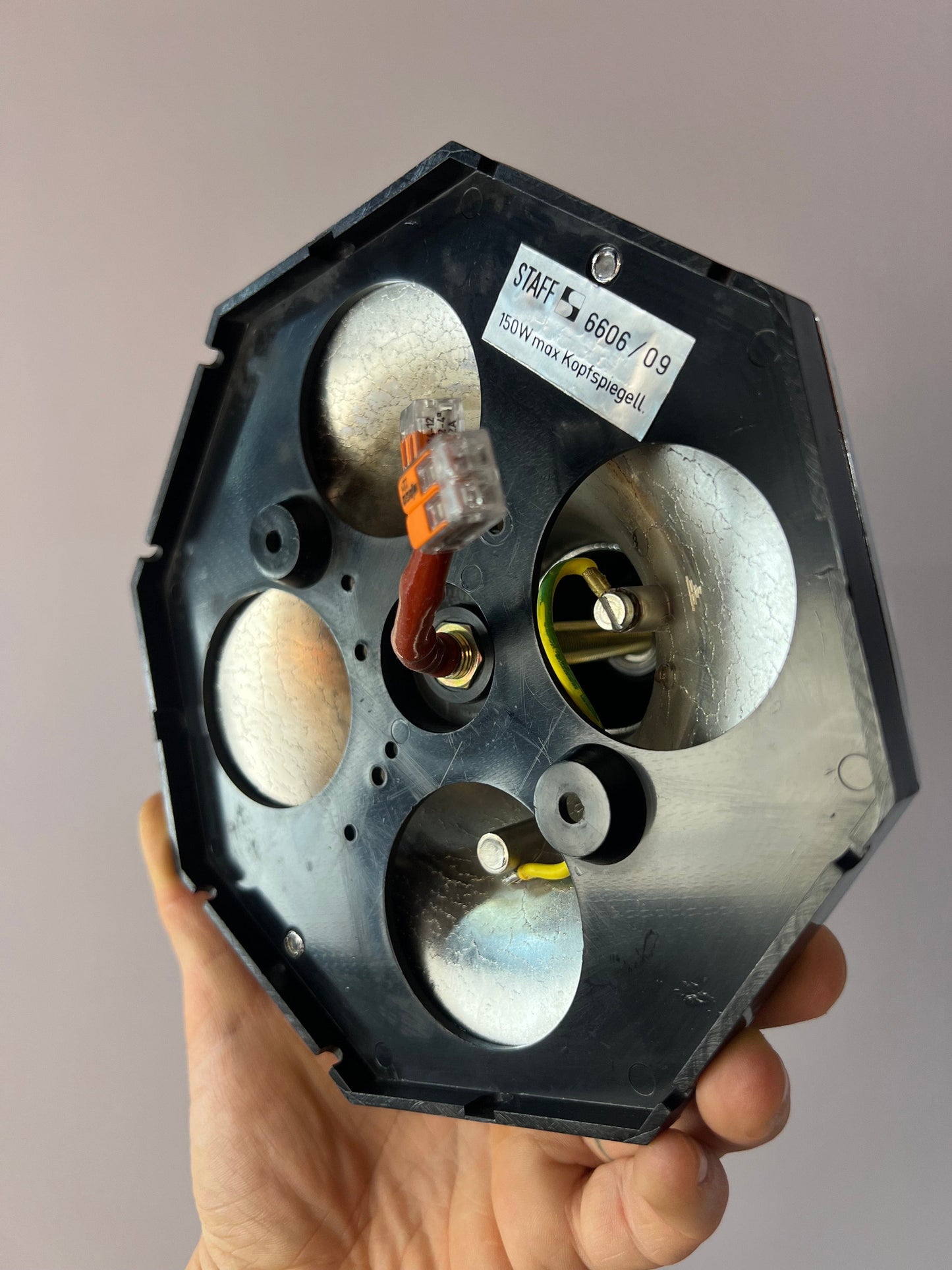 Vintage head mirror wall lamp by STAFF