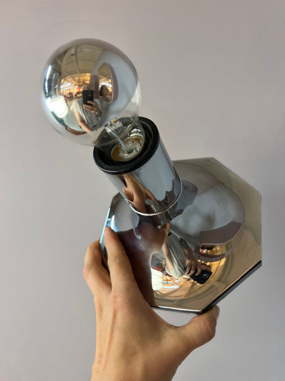 Vintage head mirror wall lamp by STAFF