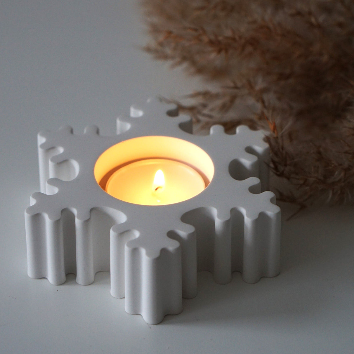 Handmade snowflake tealight holder