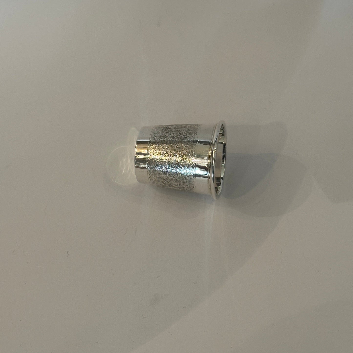 Vintage silver cup by Cartier with cross-hatch decoration