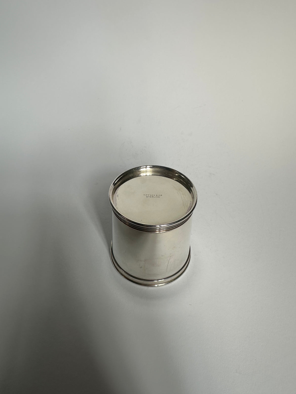 Vintage cylindrical silver cup by Tiffany & Co.