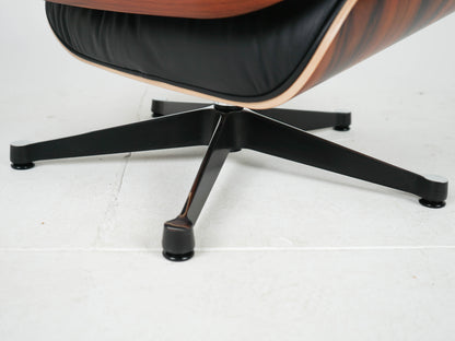 Vintage Sessel Eames Lounge Chair und Ottoman von Charles und Ray Eames für Vitra Schwarz