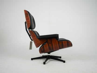 Vintage Sessel Eames Lounge Chair und Ottoman von Charles und Ray Eames für Vitra Schwarz