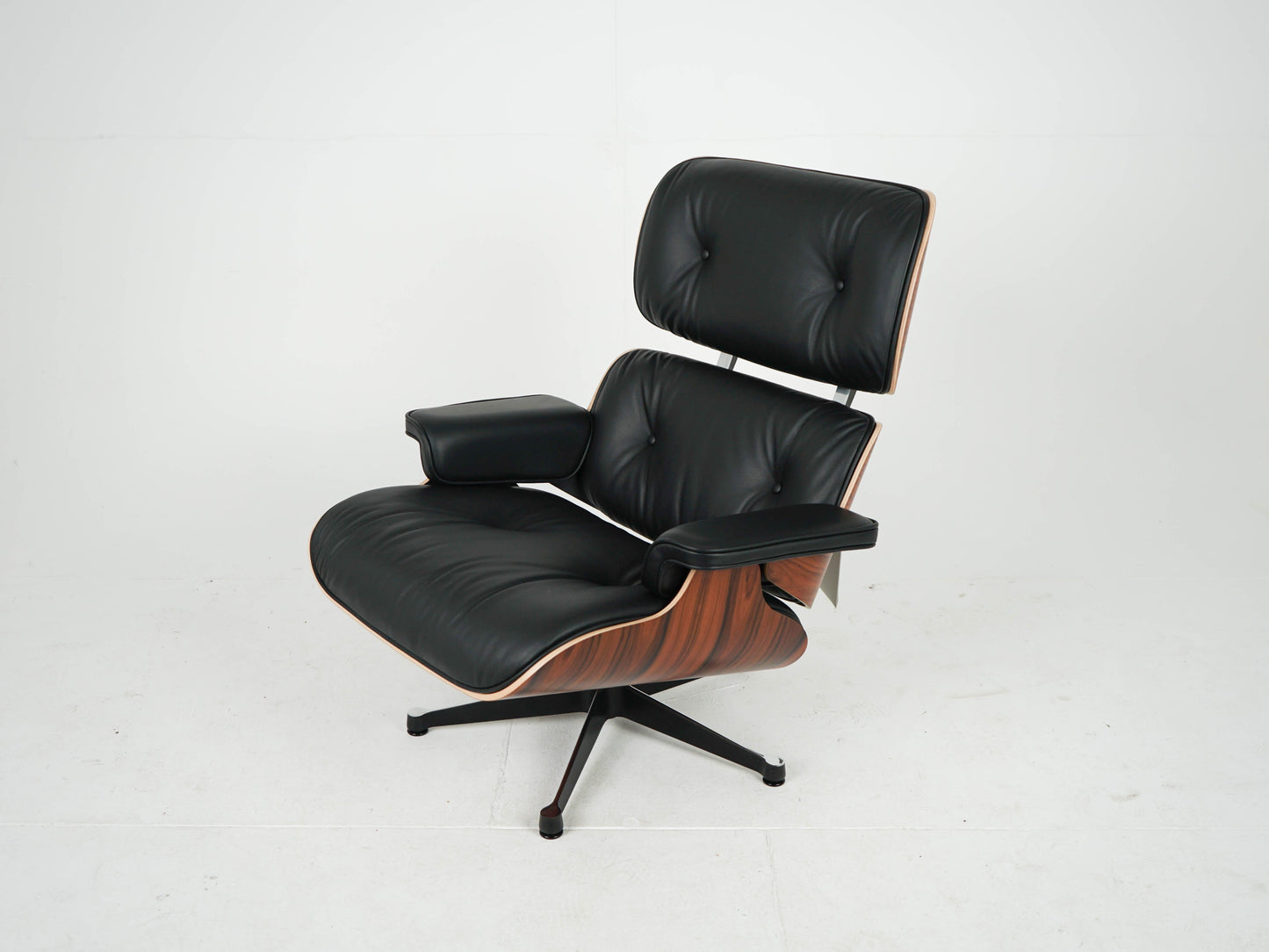 Vintage Sessel Eames Lounge Chair und Ottoman von Charles und Ray Eames für Vitra Schwarz