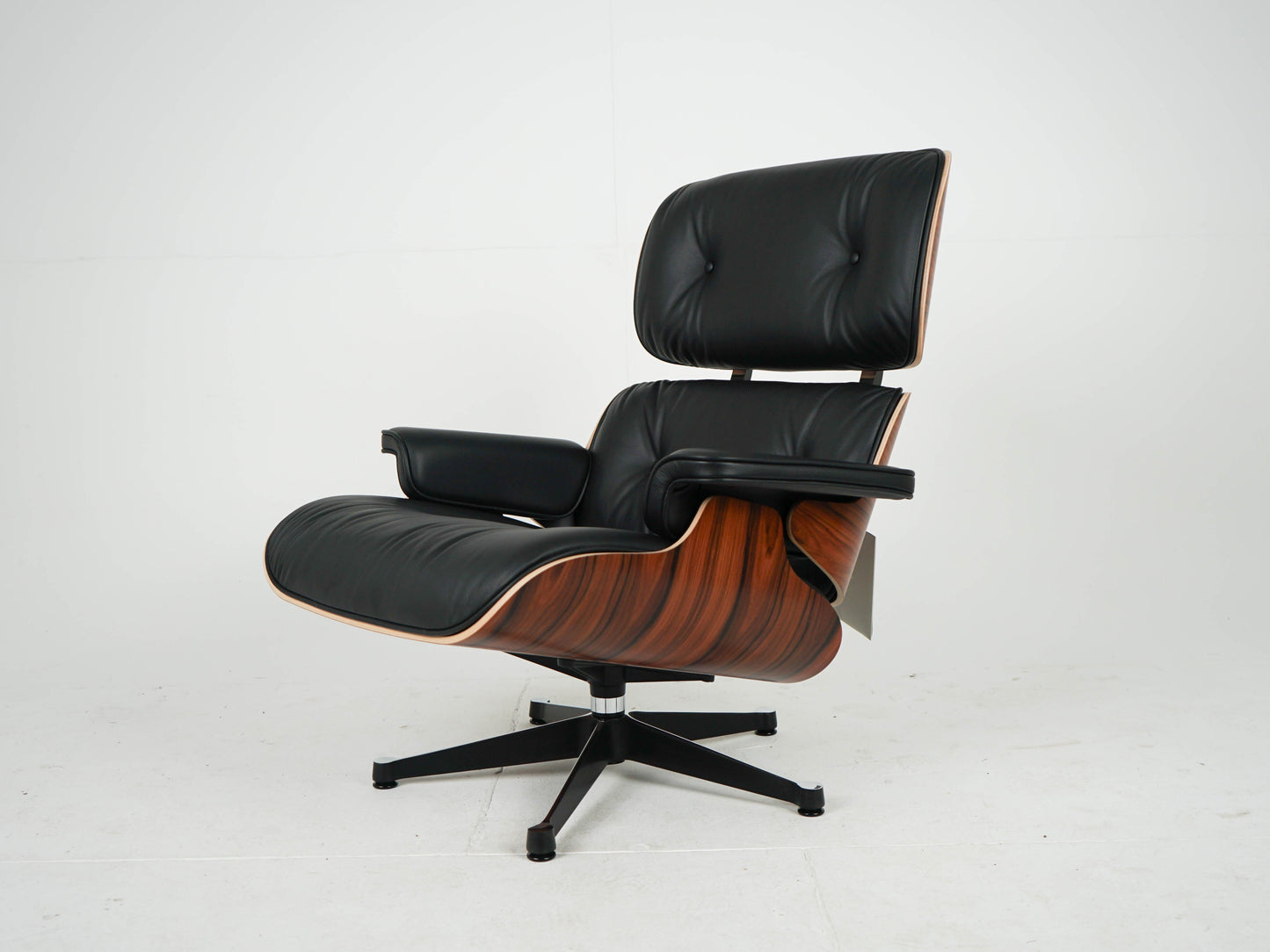Vintage Sessel Eames Lounge Chair und Ottoman von Charles und Ray Eames für Vitra Schwarz