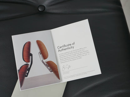 Vintage Sessel Eames Lounge Chair und Ottoman von Charles und Ray Eames für Vitra Schwarz