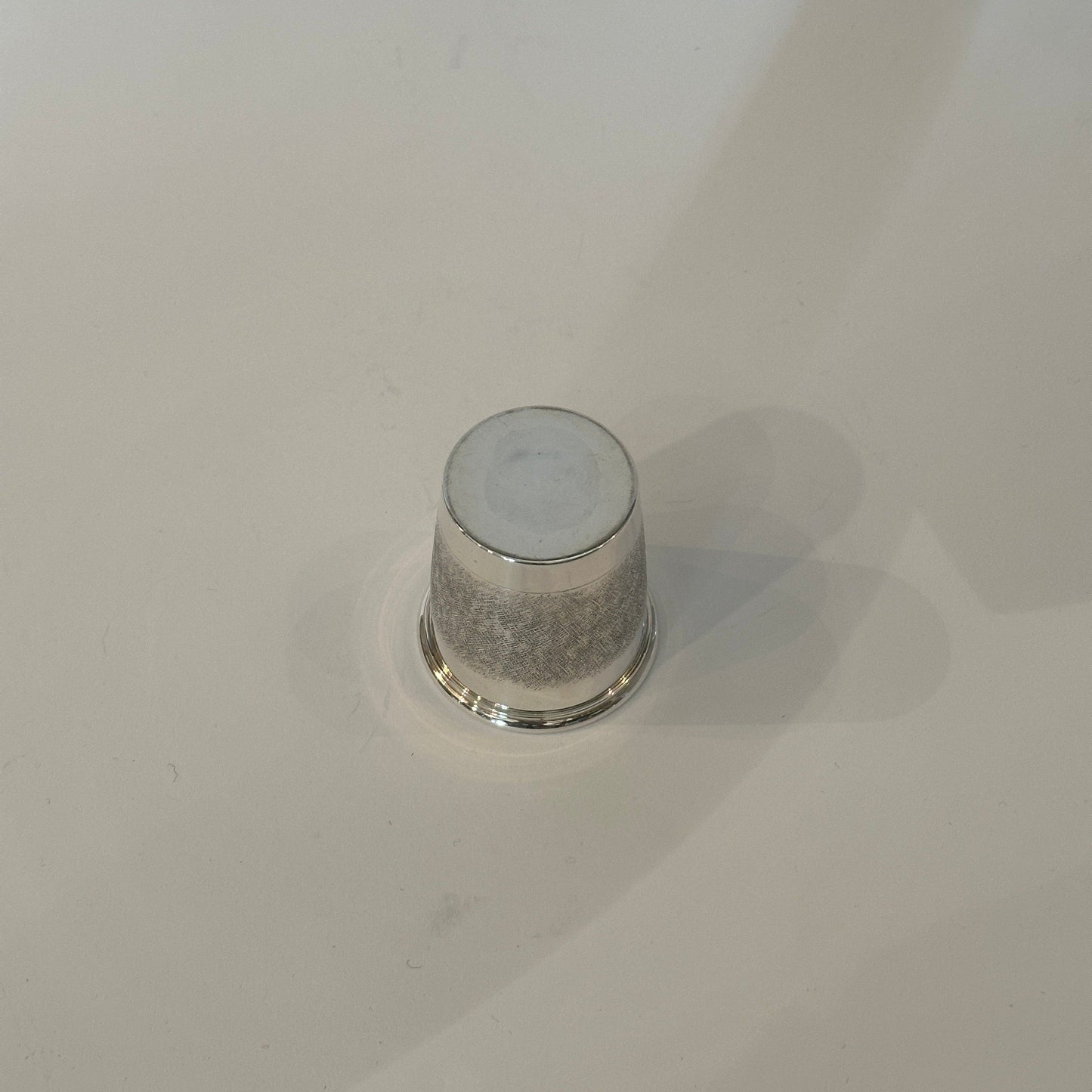 Vintage silver cup by Cartier with cross-hatch decoration