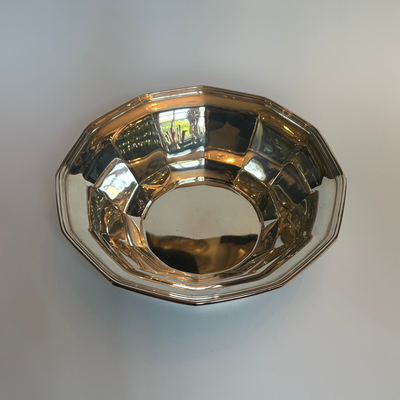 Vintage round silver bowl by Tiffany & Co. with smooth mirror and ribbon rim