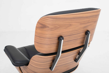 Vintage Lounge Chair und Ottoman von Charles und Ray Eames für Herman Miller, Nussbaum und Leder