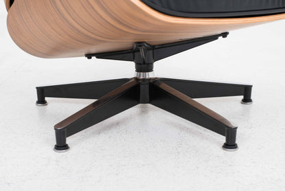 Vintage Lounge Chair und Ottoman von Charles und Ray Eames für Herman Miller, Nussbaum und Leder