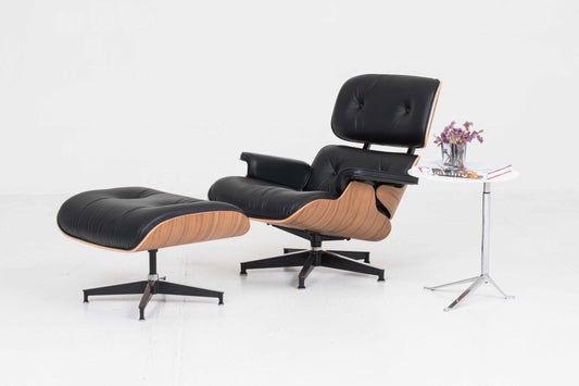 Vintage Lounge Chair und Ottoman von Charles und Ray Eames für Herman Miller, Nussbaum und Leder