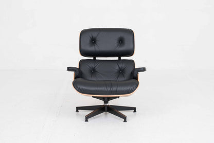 Vintage Lounge Chair und Ottoman von Charles und Ray Eames für Herman Miller, Nussbaum und Leder