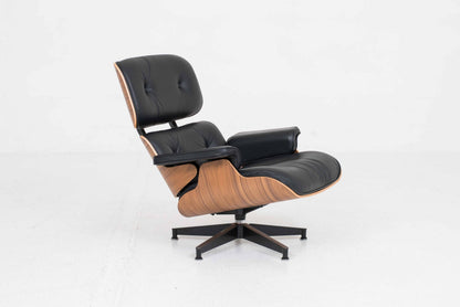 Vintage Lounge Chair und Ottoman von Charles und Ray Eames für Herman Miller, Nussbaum und Leder