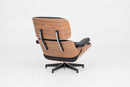 Vintage Lounge Chair und Ottoman von Charles und Ray Eames für Herman Miller, Nussbaum und Leder