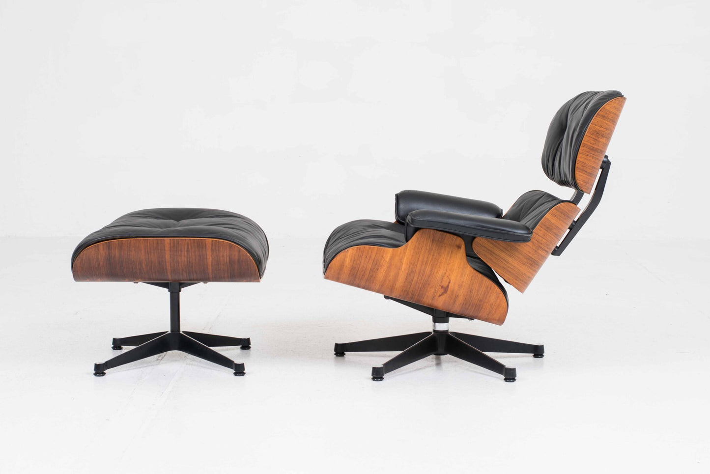 Vintage Lounge Chair und Ottoman 670 von Charles und Ray Eames für Vitra, Palisander