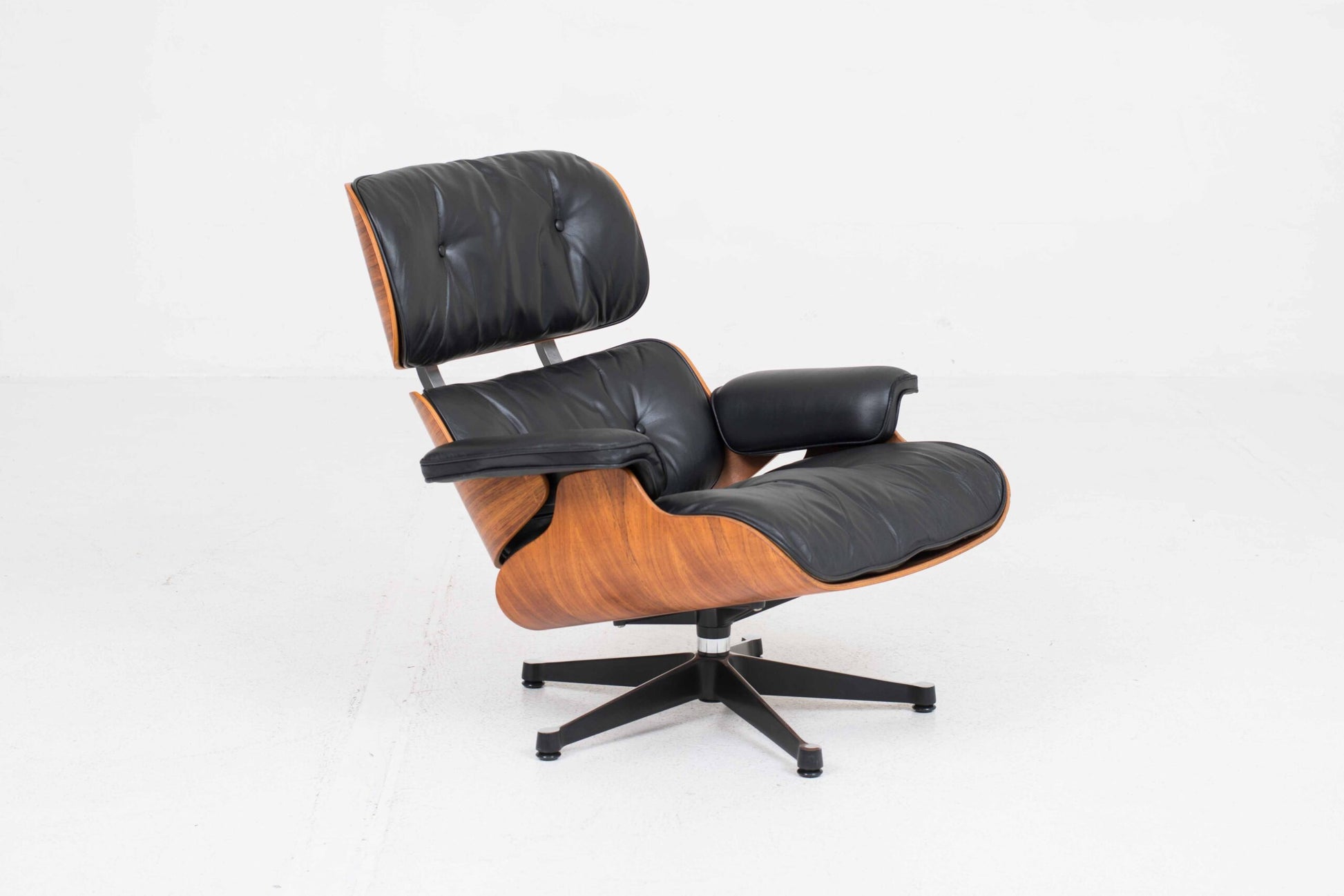 Vintage Lounge Chair und Ottoman 670 von Charles und Ray Eames für Vitra, Palisander