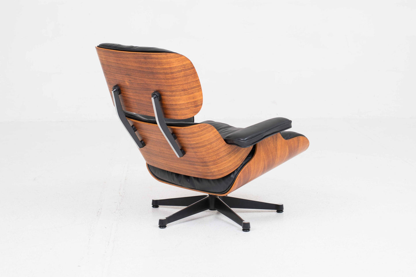 Vintage Lounge Chair und Ottoman 670 von Charles und Ray Eames für Vitra, Palisander