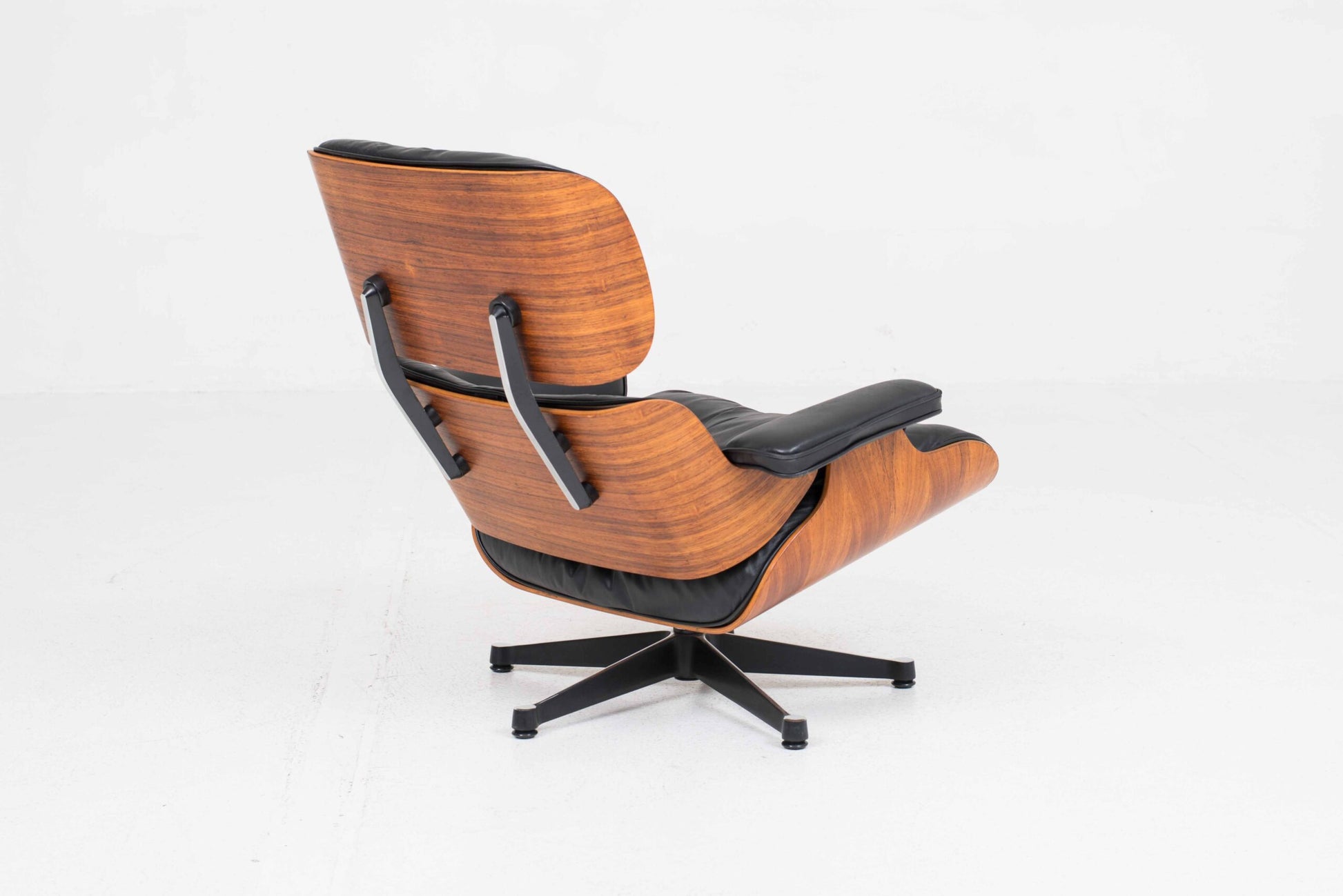 Vintage Lounge Chair und Ottoman 670 von Charles und Ray Eames für Vitra, Palisander