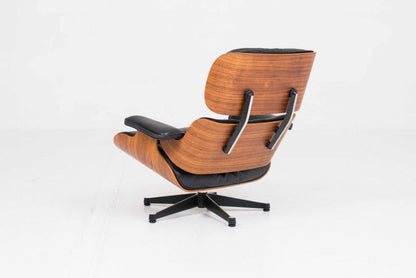 Vintage Lounge Chair und Ottoman 670 von Charles und Ray Eames für Vitra, Palisander