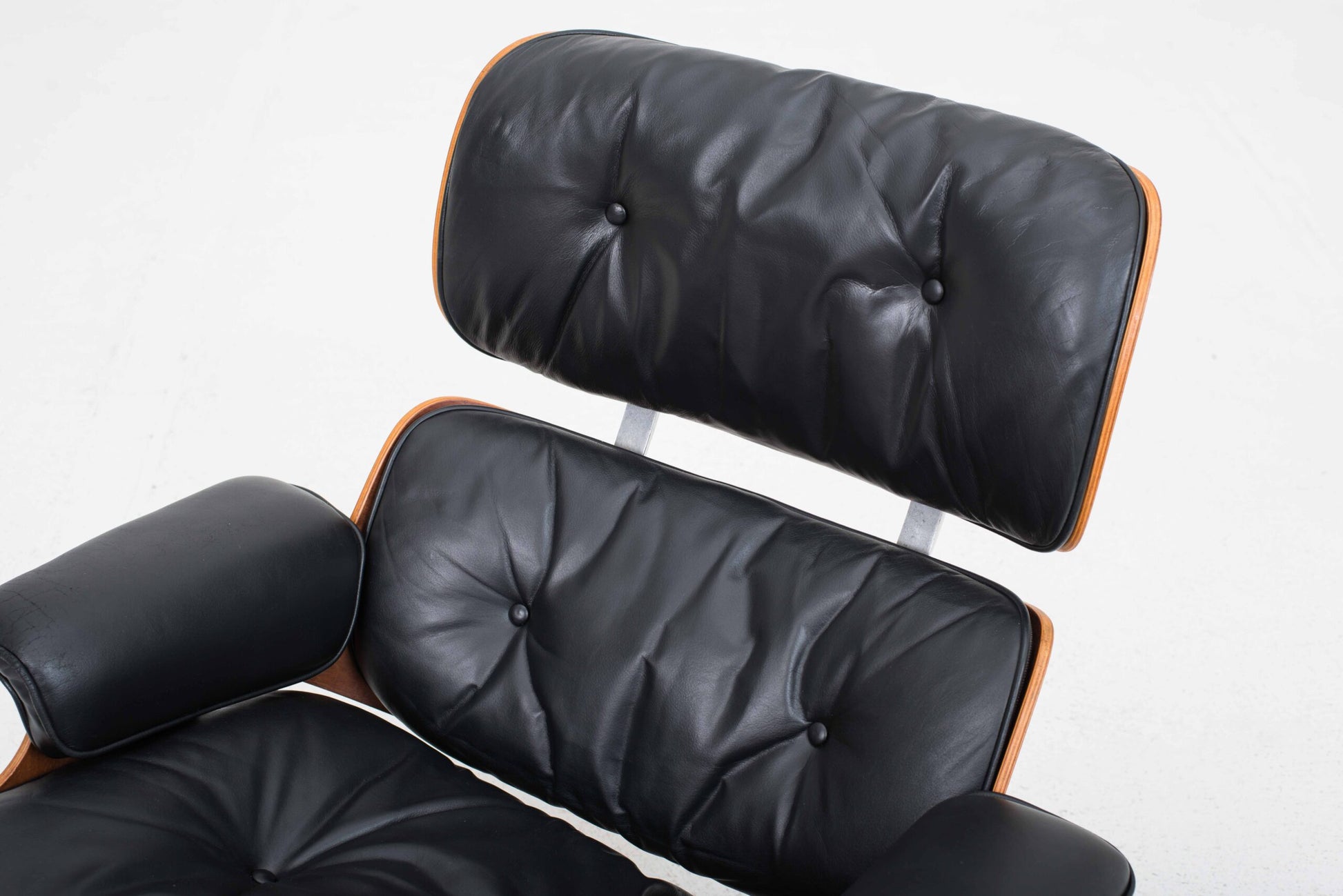 Vintage Lounge Chair und Ottoman 670 von Charles und Ray Eames für Vitra, Palisander